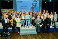Gruppenfoto auf einer Bühne